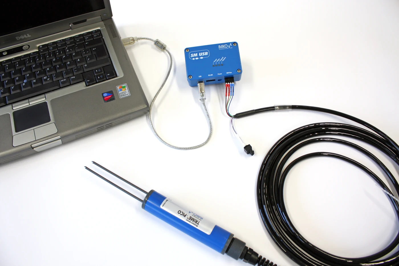 SM-USB converter connecting a TRIME moisture probe to a laptop for calibration and data logging